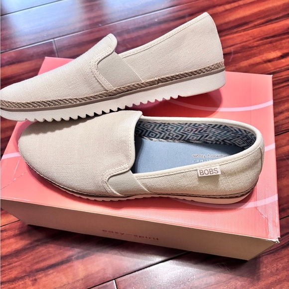 BOBS by Skechers Women’s Cream Slip-On Shoes - Picture 1 of 6